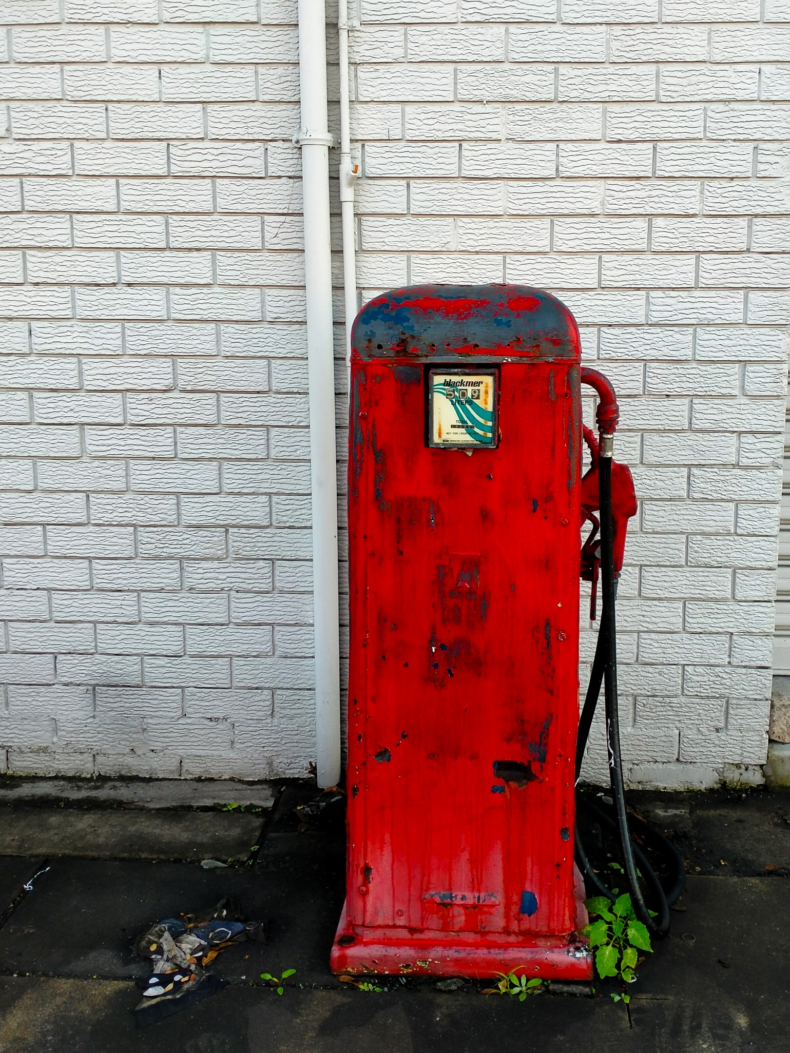 old red petrol pump